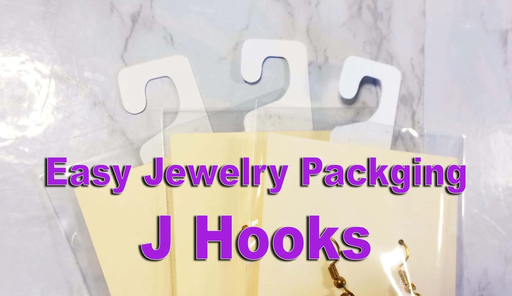 Easy jewelry packaging with J hooks